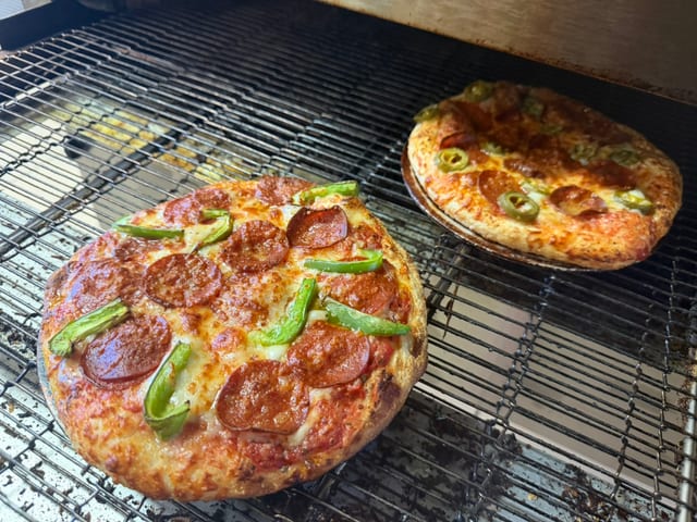 Mini 2-Topping Pizza & 12 oz Soda.