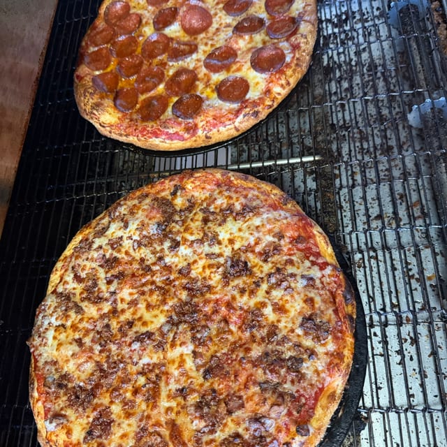 2 Medium 1-Topping Pizzas.