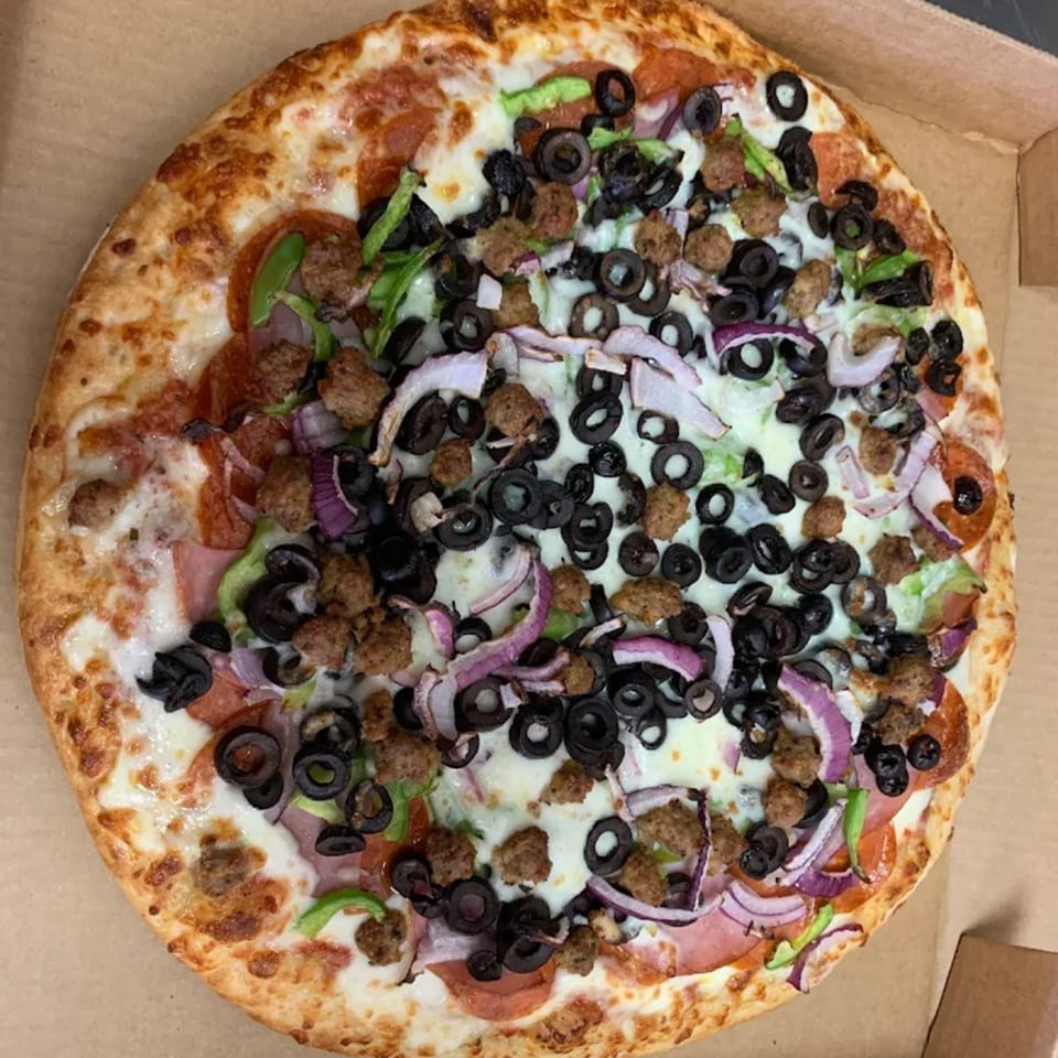 A 7th Street Pizza with pepperoni, sausage, black olives, green peppers, and red onions.